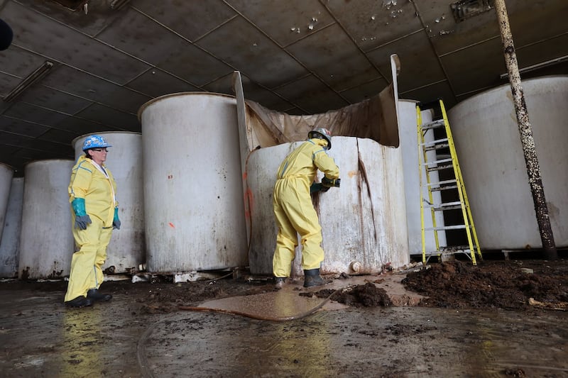 First load of rotting, decades-old fish sauce trucked away from abandoned N.L. plant