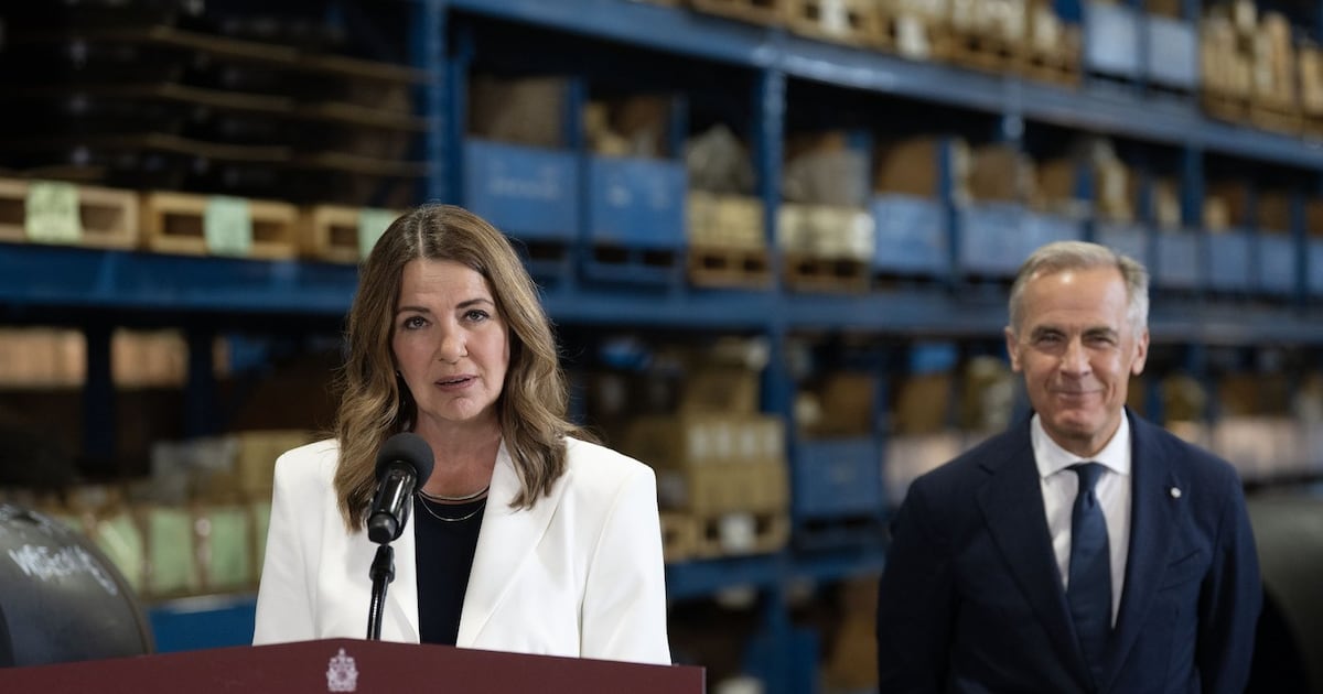 Prime Minister Mark Carney and Alberta Premier Danielle Smith announce a proposed pipeline from Alberta to the B.C. coast in Calgary on Thursday, July 2, 2026. THE CANADIAN PRESS/Todd Korol