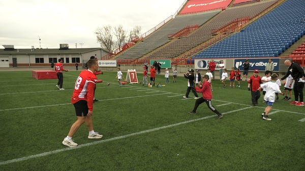 Stampeders rookies put young fans through their paces at Junior Stamps Camp