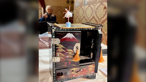 A music box with a little ballerina is pictured.