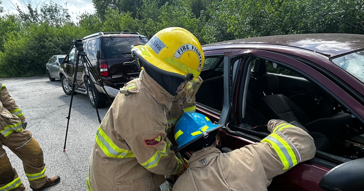 High school students suit up to learn about firefighting in London