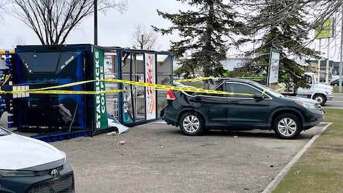 A sign fell and crushed a car in the parking lot of London Drugs in the 3500 block of 32 Avenue N.E. on Friday, April 24, 2026.