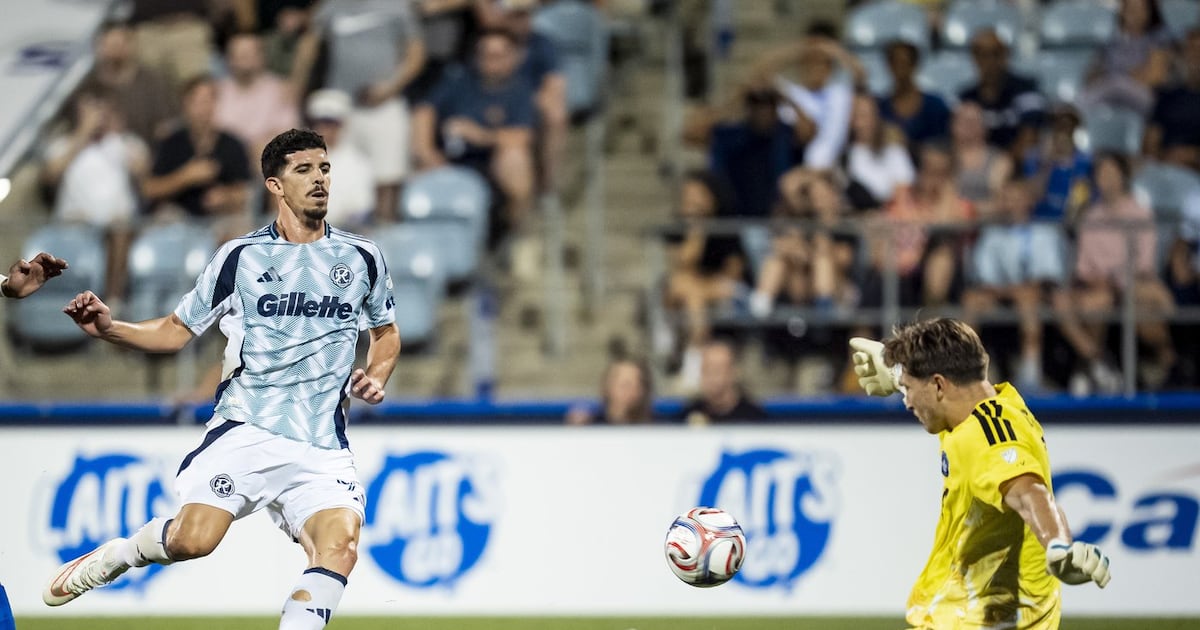 CF Montréal goalkeeper Sébastian Breza (1) makes a save against New England Revolution forward Dor Turgeman (99) during an MLS football match on Saturday, 1 August 2026 in Montreal. (Christopher Katsarov/The Canadian Press)