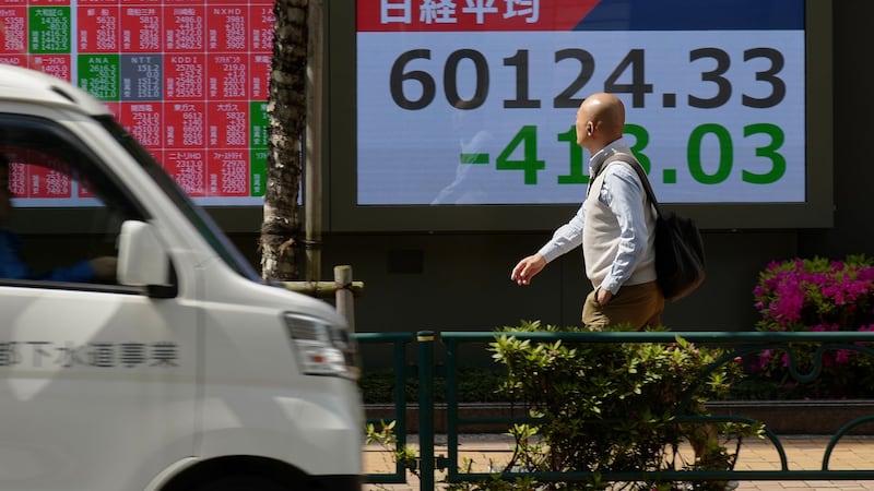 Sinking AI stocks and higher oil prices weigh on Wall Street