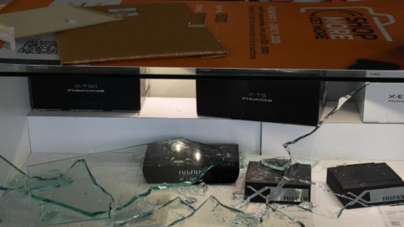 Henry's Camera store scene of a smash-and-grab