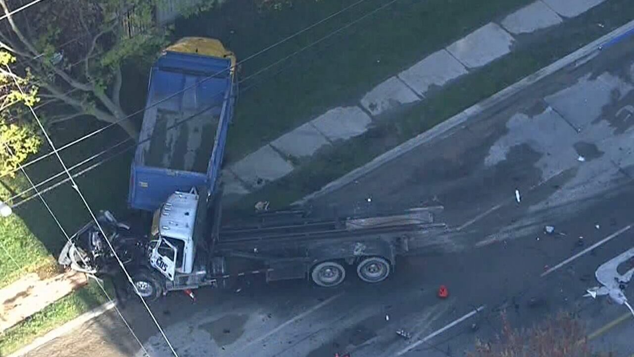 Two people in hospital after flatbed and dump truck collide in Etobicoke