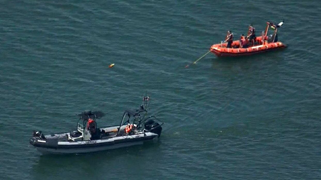 One person rescued, search continues for another after boat capsizes near C