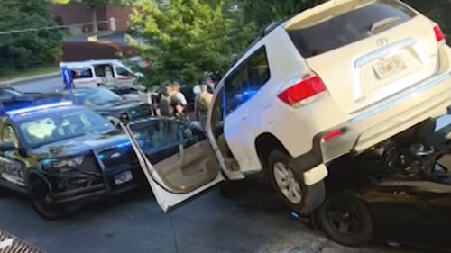 Car ends up on top of patrol vehicle after police chase