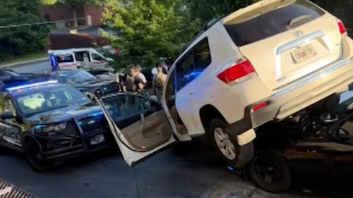 Fleeing suspect’s car winds up on top of police cruiser