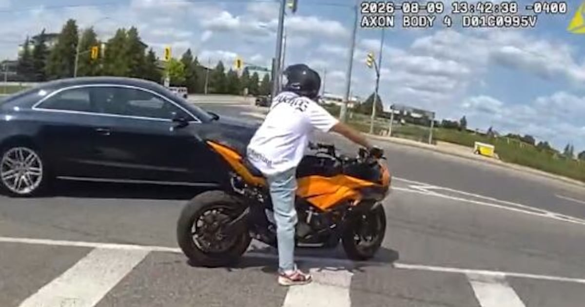 WATCH: YRP officer tackles man off motorcycle - CTV News